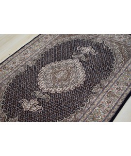 Kamal al-Mulk's half and half small fish circle carpet